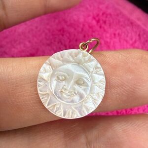 Mother of pearl sun pendant 10k